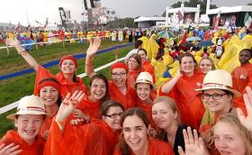 "Cheerful, despite 90 degree heat and mud up to your ankles"